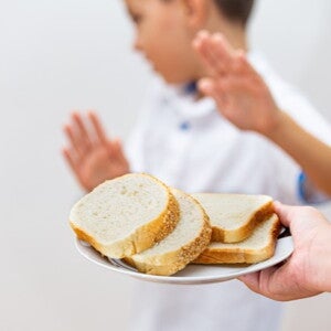 child refusing to eat bread child refusing to eat bread