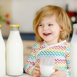 Toddler drinking cows milk Toddler drinking cows milk